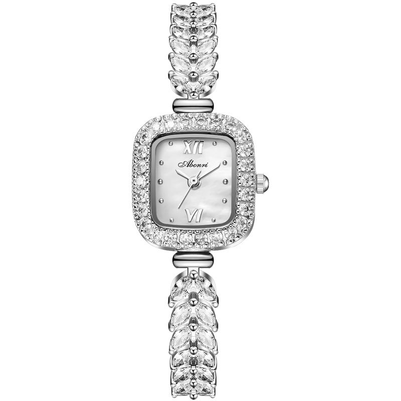 Delicate Luxury Jeweled Quartz Watch (Feine Luxusuhr – Quarzwerk mit Edelsteinbesatz)
